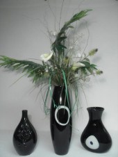 Lot of two black art vases and