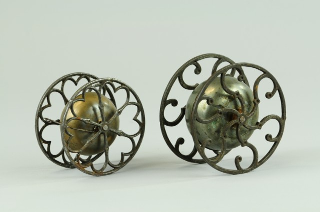 LOT OF TWO ROLLER WHEEL BELL TOYS