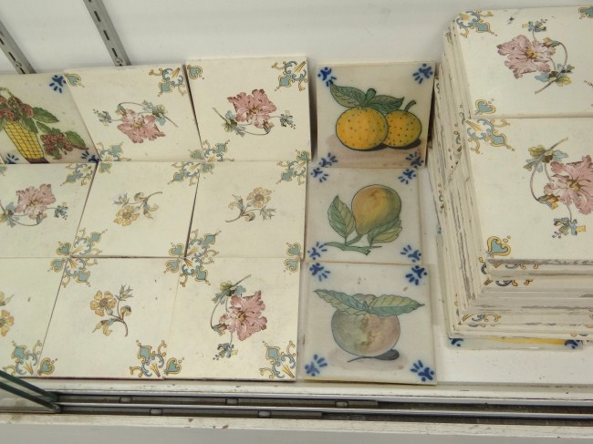 Lot over 90 ceramic tiles.