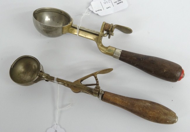 Lot two early ice cream scoops. One