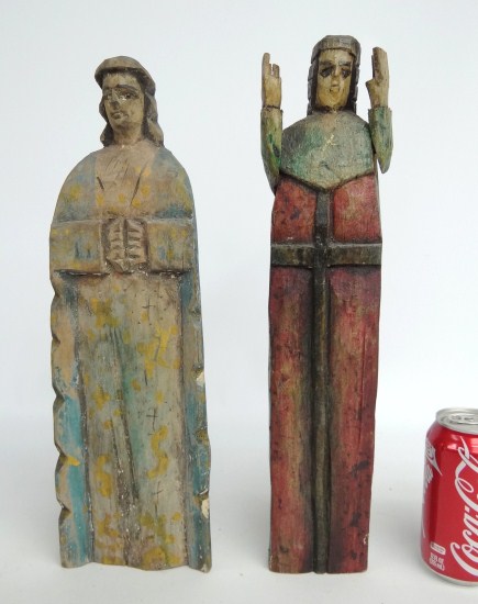 Lot two painted wooden Santos
