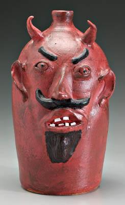 Louis Brown devil jug, broken china