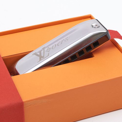 LOUIS VUITTON HARMONICA AND A