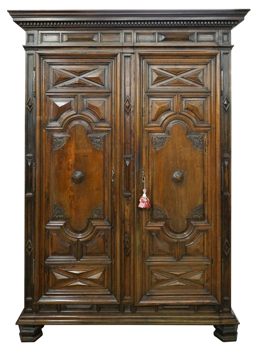 LOUIS XIII-STYLE CARVED WALNUT