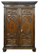 LOUIS XIII-STYLE CARVED WALNUT