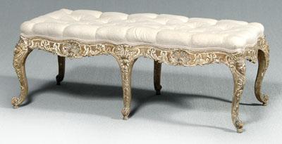 Louis XV carved and gilt bench,
