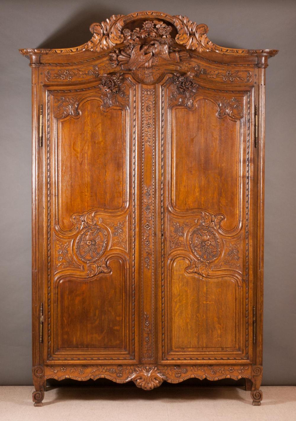 LOUIS XV CARVED OAK ARMOIRE,