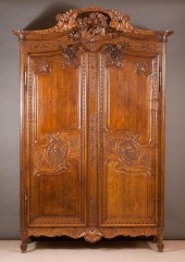 LOUIS XV CARVED OAK ARMOIRE, F