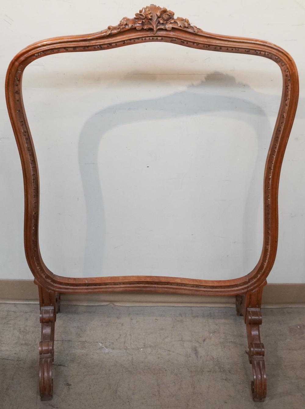 LOUIS XV STYLE CARVED WALNUT FIRE