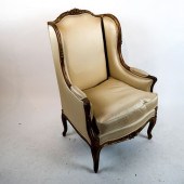 LOUIS XV-STYLE GILT WING CHAIR