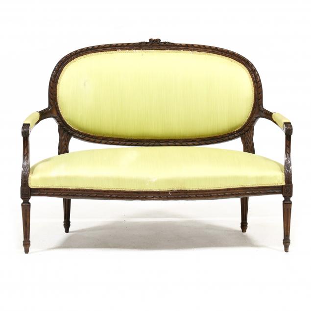 LOUIS XVI STYLE CARVED WALNUT