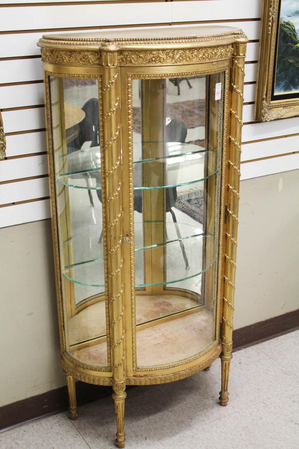 LOUIS XVI STYLE GILTWOOD AND CURVED
