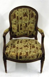 Louis XVI style walnut fauteui