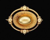Low karat yellow gold brooch l