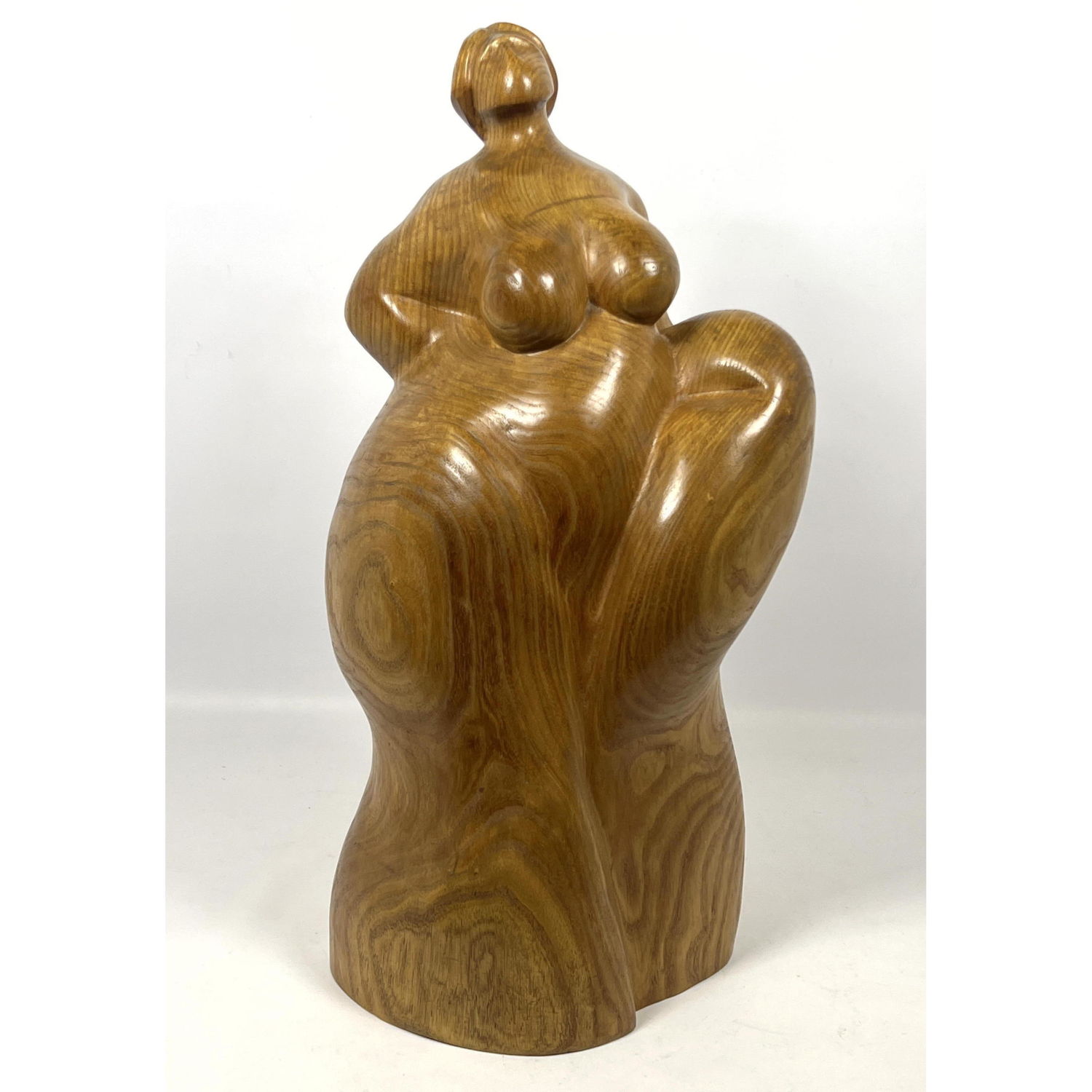 LS signed wood sculpture of