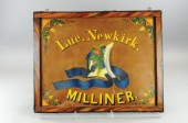 ''LUE NEWKIRK MILLINER'' SIGN