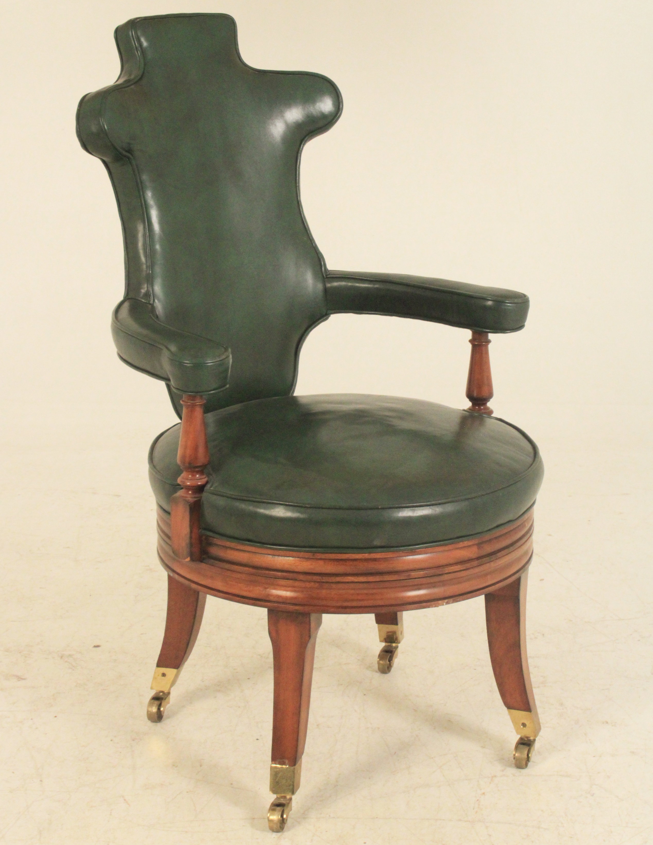 MAHOGANY AND LEATHER SWIVEL SEAT