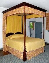 Mahogany bedstead with cornice
