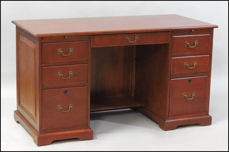 MAHOGANY KNEE HOLE DESK. H: 30'' W: