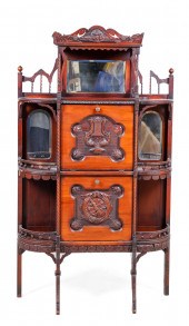 Mahogany music cabinet, crest