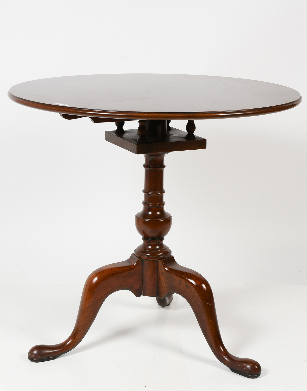 MAHOGANY TILT TOP SNAKE FOOT TABLE: