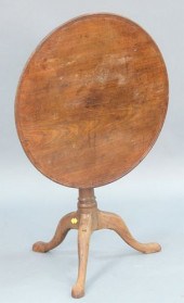 MAHOGANY TIP TABLE HAVING DISH