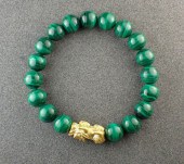 MALACHITE AND TWENTY-FOUR KARA