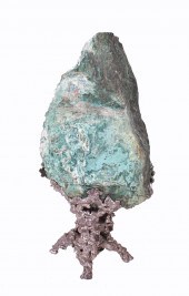 MALACHITE BOULDER ON BRUTALIST