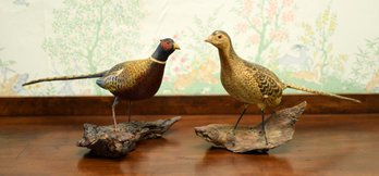 Male and female carved and