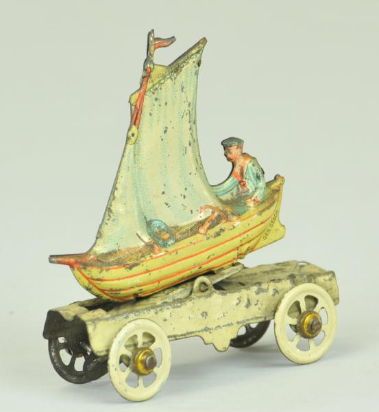 MAN IN SAILBOAT PENNY TOY Meier
