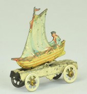 MAN IN SAILBOAT PENNY TOY Meie