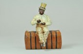 MAN ON COTTON BALE DOORSTOP Ex