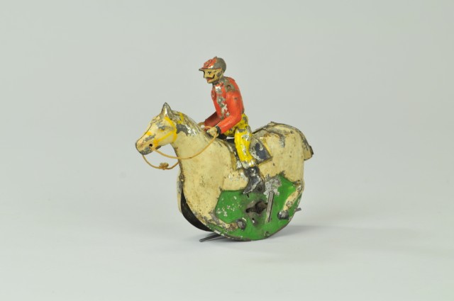 MAN ON HORSE TIN TOY Germany hand