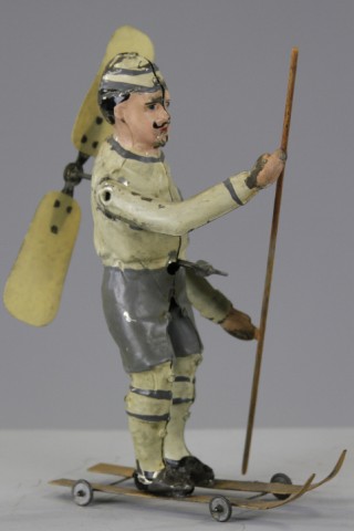 MAN ON SKIS WITH PROPELLER