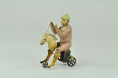 MAN RIDING HORSE TRICYCLE Germ