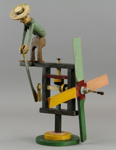 MAN TURNING LEVER WHIRLIGIG c.