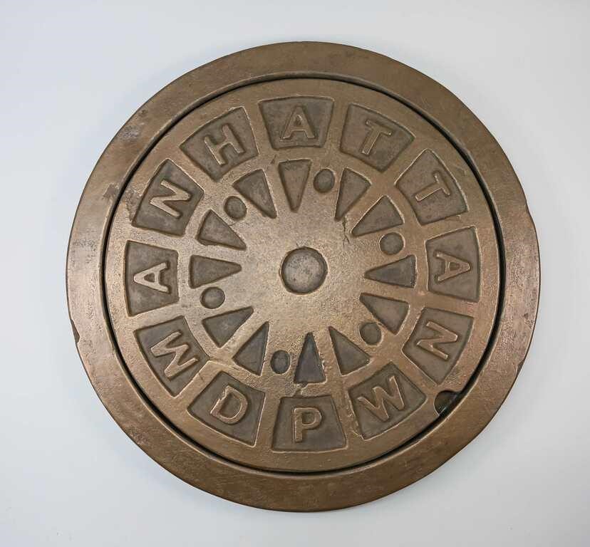 MANHOLE COVER SCULPTURE SIGNED MIKE