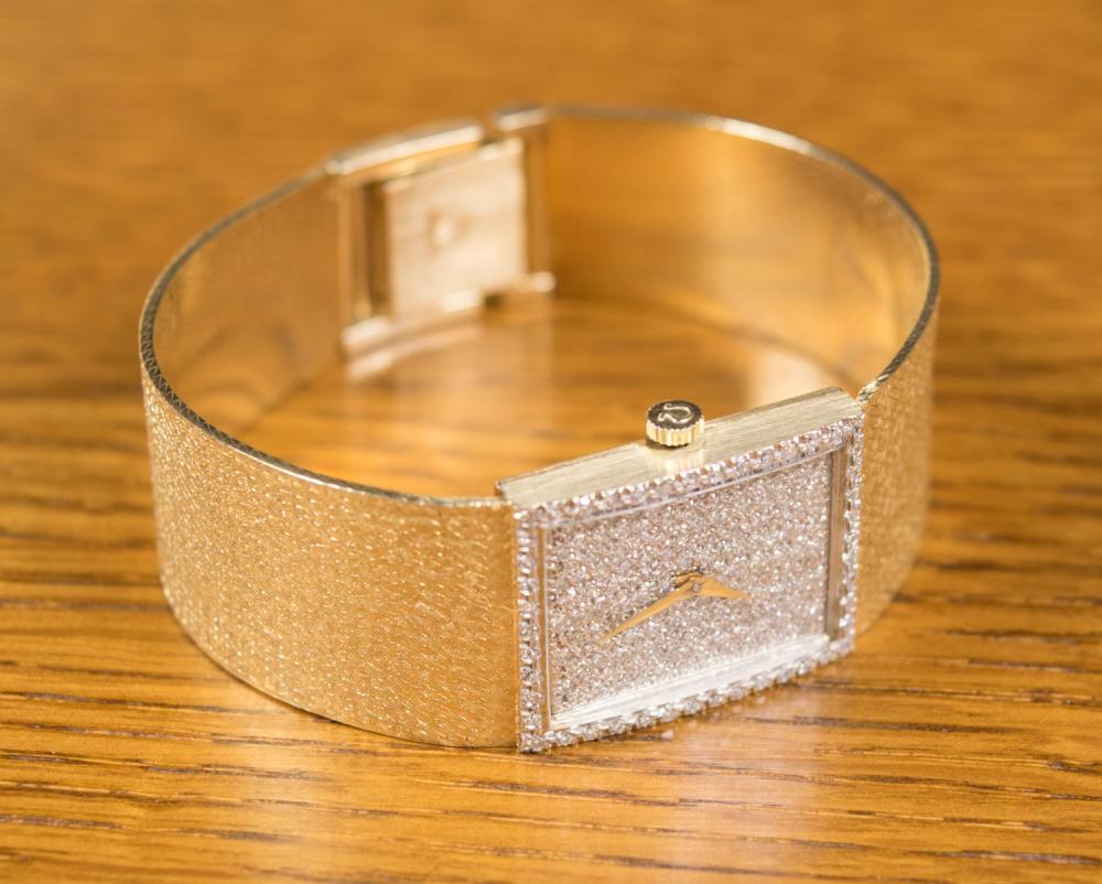 MAN'S OMEGA DIAMOND AND FOURTEEN