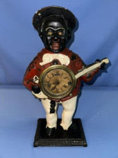 MANTLE CLOCK, MAN PLAYING BANJ