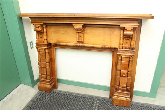 MANTLE. Walnut with carved and