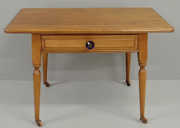 Maple tavern table 20th c. with a