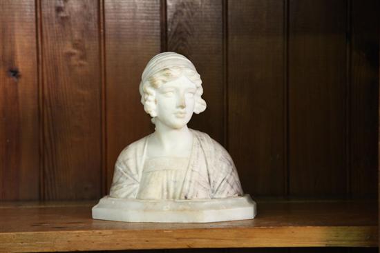 MARBLE BUST. Of a hooded maiden.