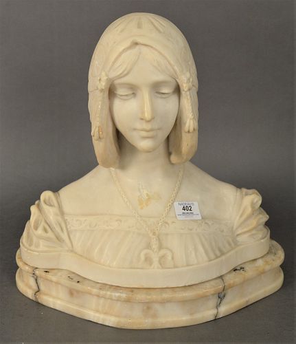MARBLE BUST OF A WOMAN, WEARING A