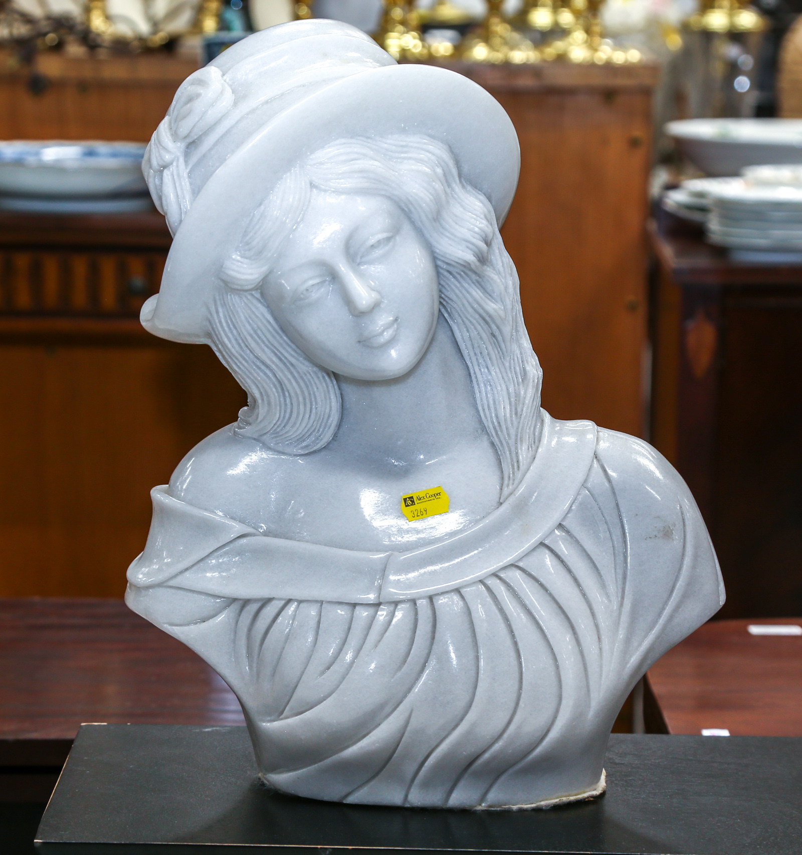 MARBLE BUST OF YOUNG WOMAN