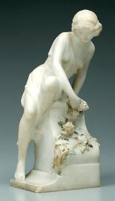 Marble figure of seated woman