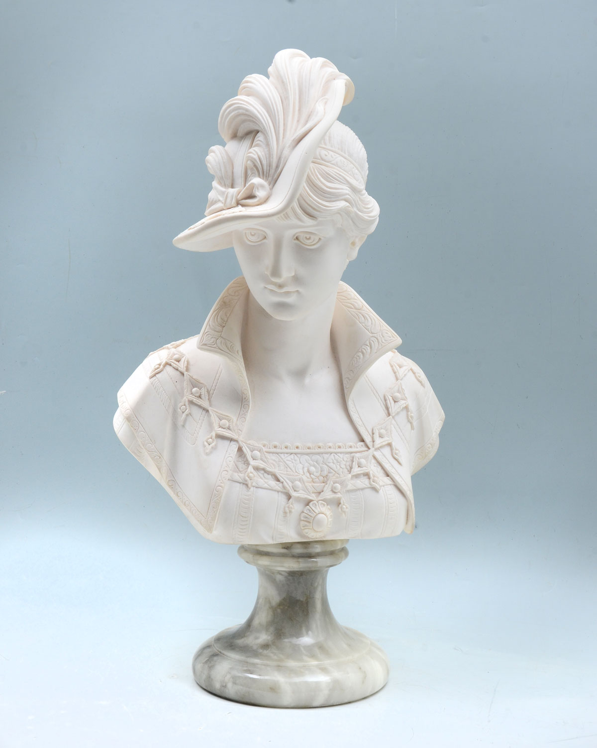 MARBLE SCULPTURE OF A WELL TO-DO
