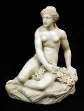 MARBLE SCULPTURE OF SEATED FEM