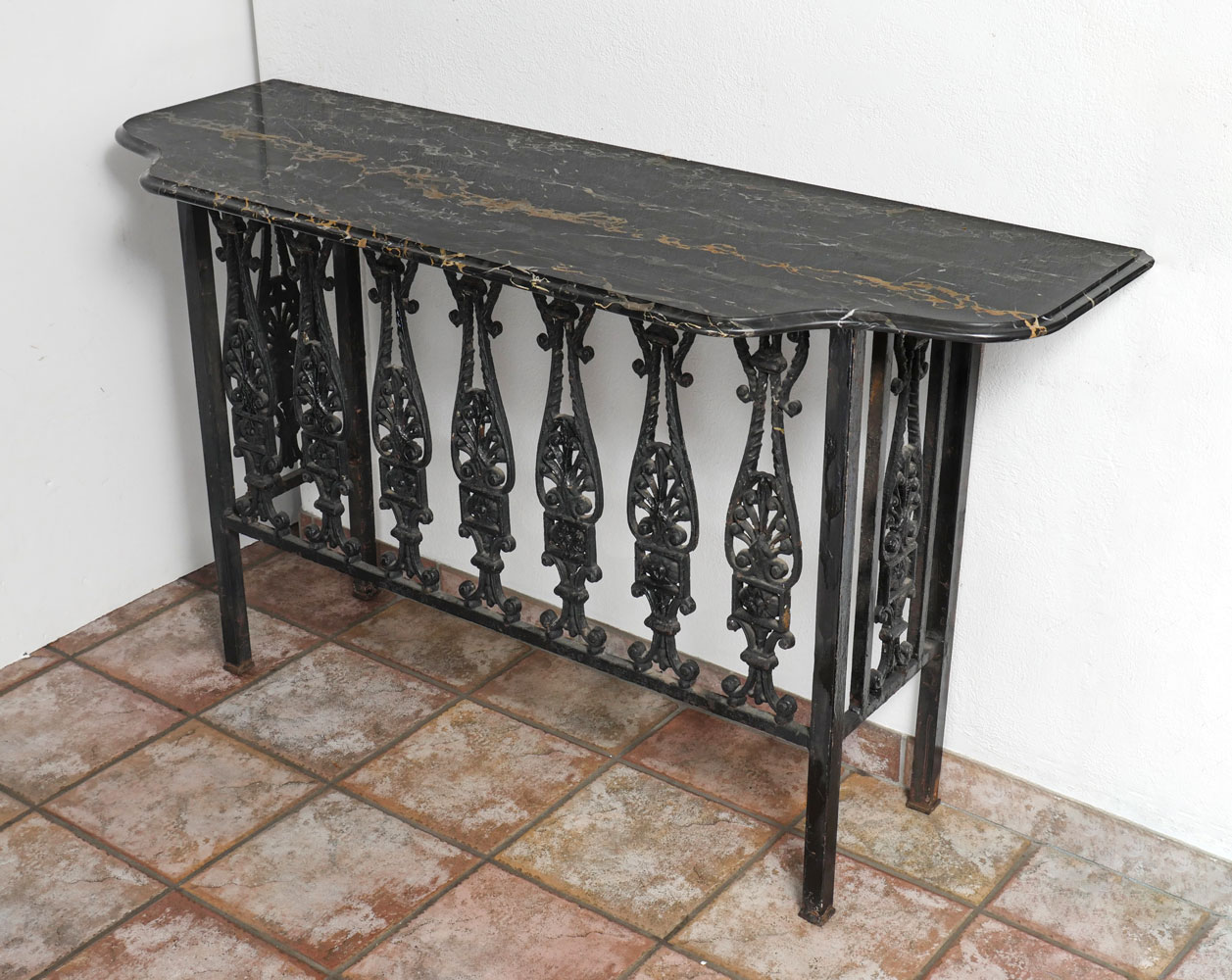 MARBLE TOP IRON TABLE: Iron hall
