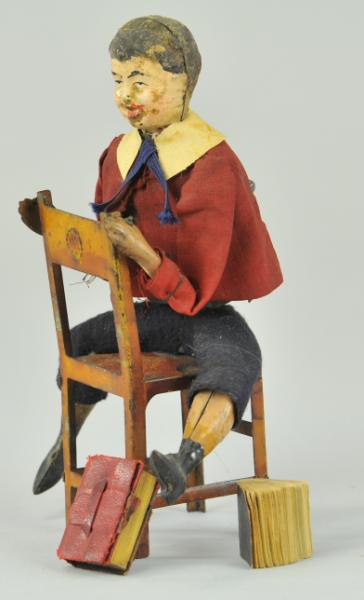 MARTIN BOY SEATED ON CHAIR France