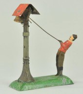 MARTIN MAN RINGING BELL IN TOW
